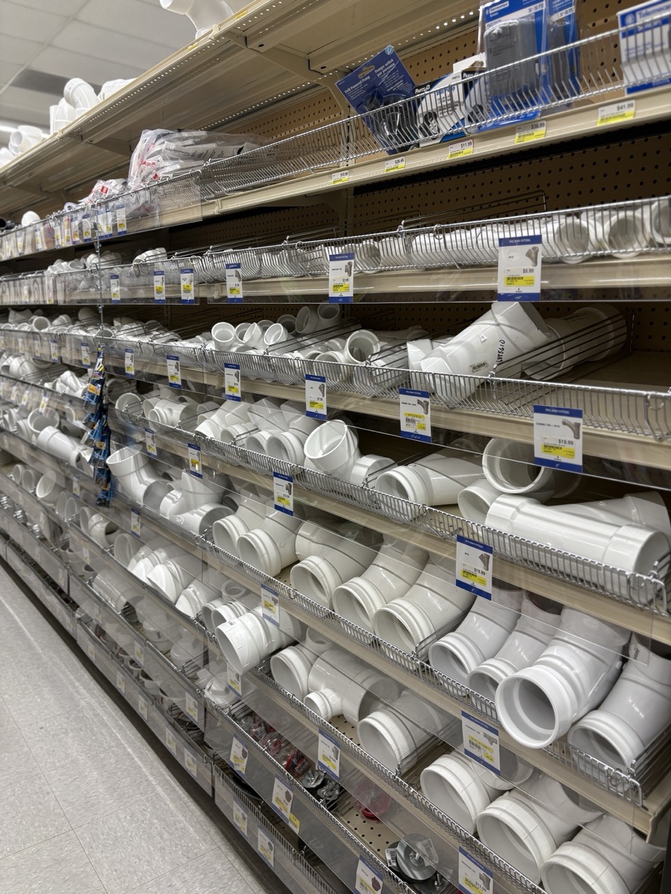 PVC plumbing fittings and repair parts aisle
